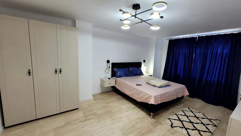 Room with bed and window.