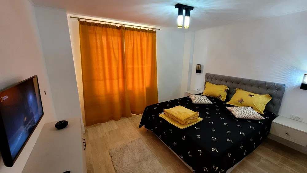 Room with bed and window.
