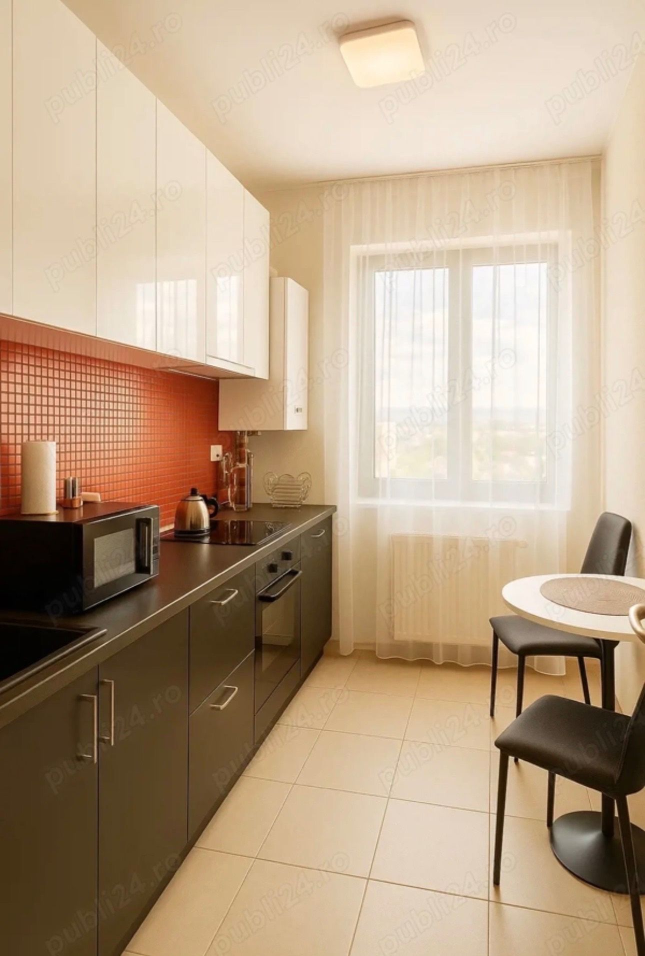 A small kitchen with a window.