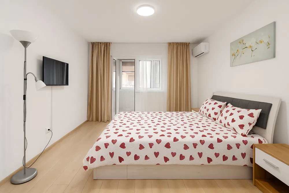 Room with bed and window.