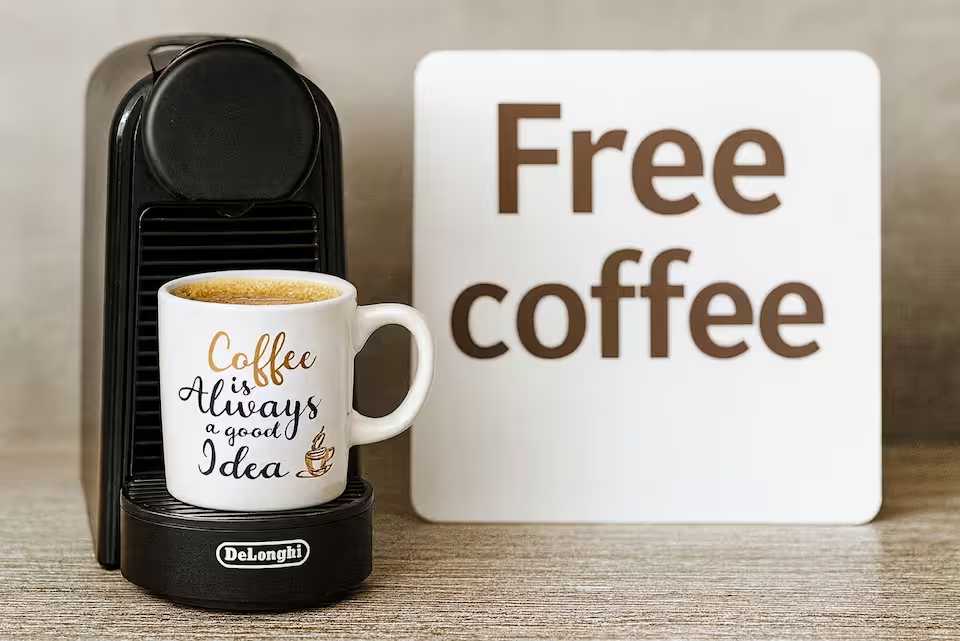 A black coffee with a white cup of coffee that says "always a good idea" on it — studio in Oradea