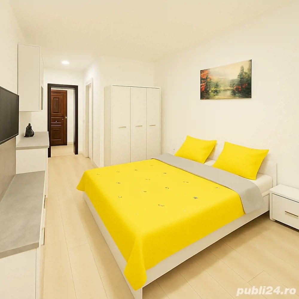 A small room with a yellow bed