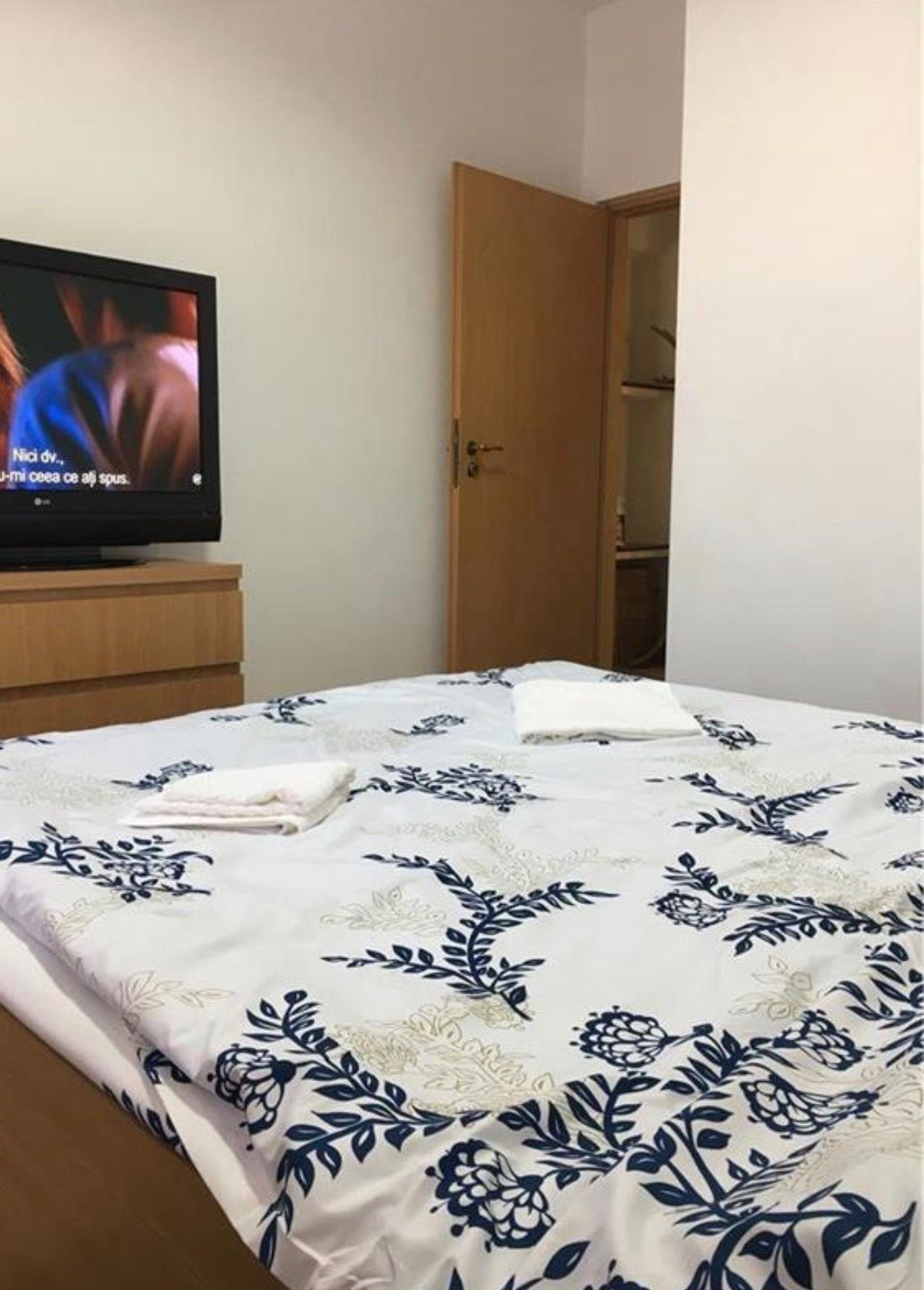 Room with bed and TV