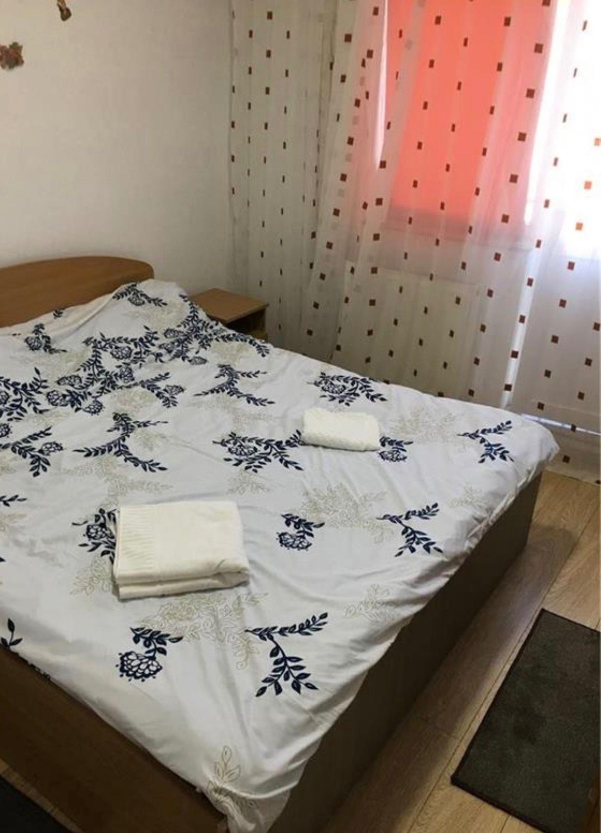 Room with bed and window.
