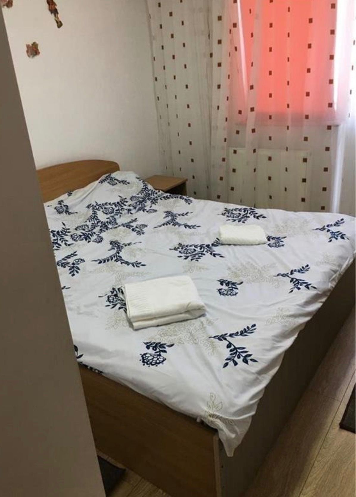 Room with bed and window.